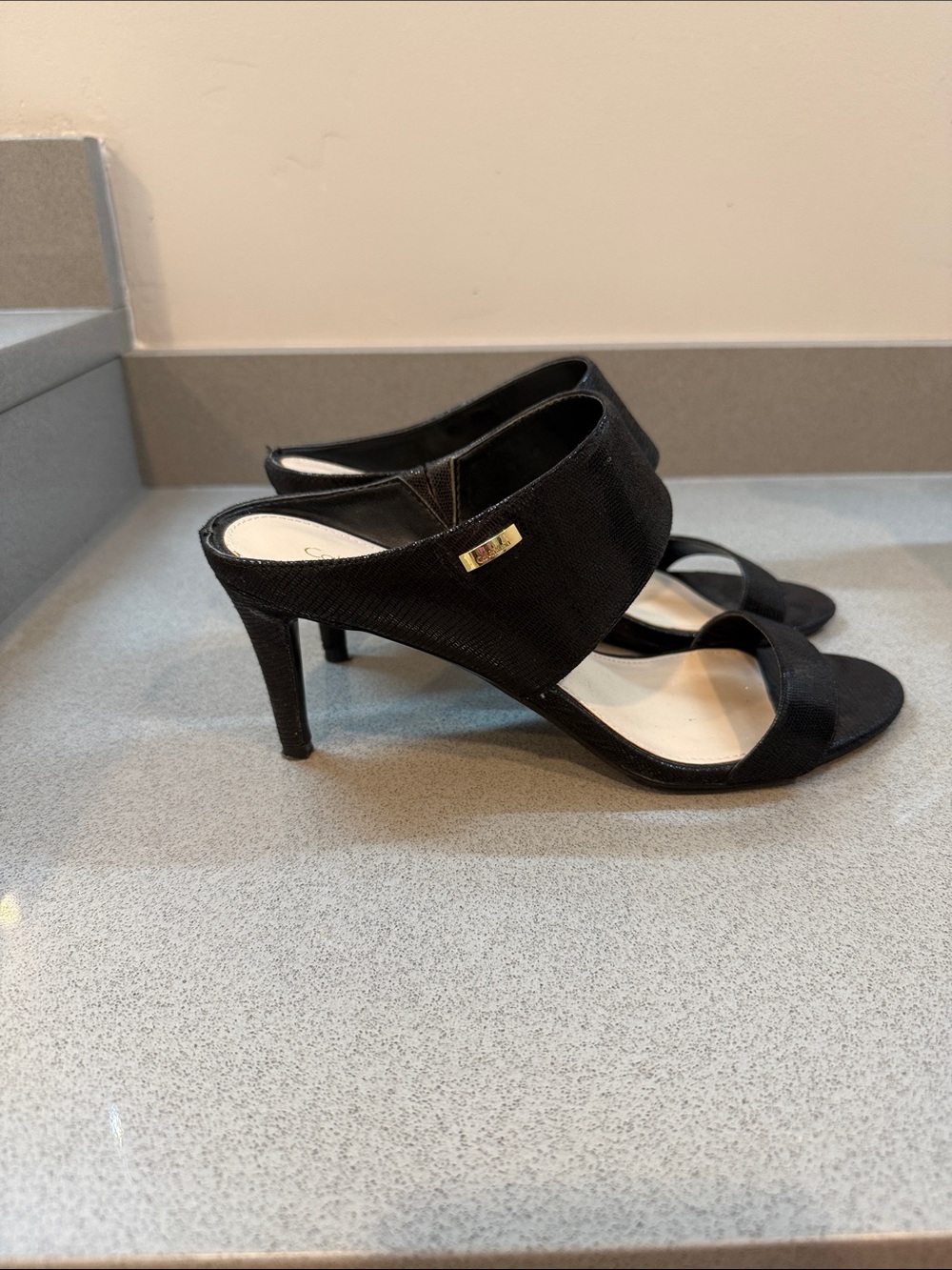 Calvin Klein Black Open-Toe Stiletto Mules with Gold Logo Plaque